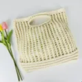 Sac cabas tricoté ajouré beige, sac de plage tissé de couleur unie style décontracté. - Abricot