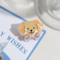 Detailaufnahme der süßen Cartoon-Hunde-Haarklammer, niedliches Tier-Haaraccessoire für Frauen. - Golden Retriever