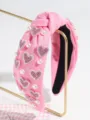 Pink knotted hair headband featuring sparkling rhinestone heart appliques and pearls for women. - Pearl Full Heart Pink