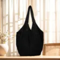 Schwarze Strick-Tasche, Häkel-Strandtasche, ausgehöhlte Damenschultertasche für den täglichen Weg. - Schwarz
