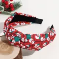 Detailed close-up of Christmas knotted fabric headband with cute snowman and classic plaid print. - Snowman Print Style / Red Plaid