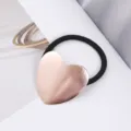 Chouchou cœur or rose avec bande élastique noire, accessoire de cheveux en métal simple. - Coeur Or Rose