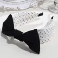 Black and white polka dot headband with elegant bow knot detail, perfect for daily fashion wear. - Bow Tie Polka Dot / White