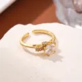 Squisito anello aperto placcato in oro con zircone scintillante e delicato fiocco per eleganza. - Stile Fiocco