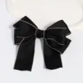 Elegante pinza de pelo con lazo negro y borde dorado accesorio de satén para mujeres. - Lazo de Encaje de Satén (Borde Dorado) / Borde Negro