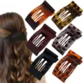 Nahaufnahme von stilvollen quadratischen Haarklammern in verschiedenen Schildpatt-Farben. - Set 6 (6 Stck) / Minimalistisches Schwarz-Braun-Set