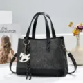 Korean style commuter tote bag, textured grey fabric with black leather trim and charm. - Black