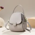 Borsa a mano mini grigia e borsa a tracolla con tasche multiple e manico superiore. - Grigio