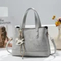 Grey spliced handbag for women, casual commuter tote bag with shoulder strap and cute horse charm. - Gray
