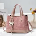 Korean style pink textured contrast tote bag with double handles, shoulder strap and cute charm. - Pink