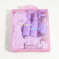 Purple spa gift set with plush headband, wristbands, and travel bottles in a pink box. - Refillable Bottle Set / Purple