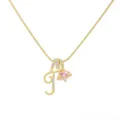 Exquisite gold-plated initial letter necklace featuring a sparkling pink heart crystal pendant. - Letter T