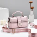 Pink vintage oil wax leather handbag with wide strap and chic metal lock design for women. - Pink
