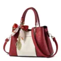 Women red beige embossed leather handbag tote shoulder bag with scarf and leaf pendant. - Burgundy