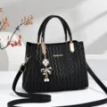 Black wavy textured women handbag tote shoulder bag with elegant clover pearl charm. - Black