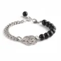 Bracelet en acier titane avec perles noires et pendentif fleur de camélia pour femme. - Acier noir