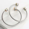 Bracelet manchette en fil d'acier inoxydable avec embouts en carbone, bijoux unisexe. - Or (Gris)