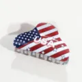 Close-up detail of heart-shaped hair claw clip featuring American flag stars and stripes design. - Heart Claw Clip / Triangle USA