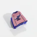 Gros plan détaillé de la pince à cheveux patriotique rouge, blanche et bleue avec motif d'aigle. - Style Vêtements Base Bleue