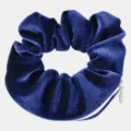 Close-up detail of dark blue velvet hair scrunchie with hidden zipper pocket design. - Navy Blue Zipper Scrunchie