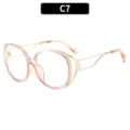 Stijlvolle kattenoog blauwlicht filterende bril met roze montuur en gouden slapen. - C7-Transparant Roze Frame