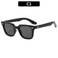 Occhiali da sole quadrati neri per bambini rivetti metallo protezione UV moda chic - Montatura Nero Lucido Lenti Grigie