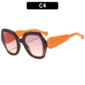 Lunettes de soleil oversize tendance pour femmes avec branches orange et verres dégradés. - Monture Thé Foncé Verre Rose Jaune