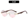 Gafas de sol redondas sin montura de moda con lentes rosa degradado y patillas de madera. - Marco Dorado Lente Gris Rosa