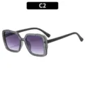 Occhiali da sole quadrati per bambini con lenti viola sfumate e montatura glitterata. - C2-Grigio Trasparente