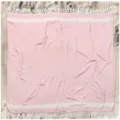 Detail view of a soft pink and white striped beach towel featuring delicate white fringe edges. - Pink