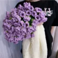 Handmade crochet purple flower blanket detail shot, exquisite yarn craft and cozy texture. - Upgraded Version - 110cm Diameter Blanket with 99 Flowers / New - Lavender Purple & Milky White Lily of the Valley Blanket