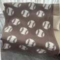 Cozy brown fuzzy blanket featuring playful white baseball patterns for warmth and comfort. - Baseball / Dark Khaki