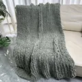 Chunky knit chenille blanket detail shot, hand-woven throw blanket for sofa decor and warmth. - Army Green