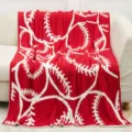 Coperta lavorata a maglia baseball rossa filato piuma dettaglio divano accogliente stile casa. - Grande Baseball / Rosso