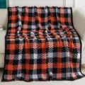 Cozy knitted jacquard throw blanket with stylish plaid pattern, soft sofa blanket for home decor. - Checkerboard and Herringbone Black and Red