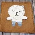 Handgemachte Strick-Babydecke mit süßem 3D-Löwen-Design, weiche Kuscheldecke für Kinder. - 90x90cm / Löwe