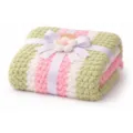 Soft knitted throw blanket with pastel stripes, ribbon bow and handmade flower. Cozy home gift. - Green and Pink