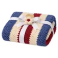 Cozy knit throw blanket in red, white, and blue stripes with elegant ribbon gift wrap. - Red and Blue