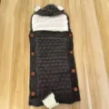 Detailed shot of dark grey knit baby sleeping bag with cute animal ears and plush hood. - Black Grey Fleece Lined