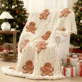Cozy chunky knit throw blanket with cute gingerbread man appliques for winter sofa decor. - Gingerbread Man