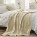 Close-up detail of cozy beige knitted throw blanket texture, soft bedroom bedding scene setup. - 127*152CM / Off White