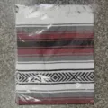 Woven Mexican blanket with geometric stripes and fringe, perfect for beach, picnic and yoga. - MC Burgundy