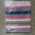 Woven Mexican blanket with geometric patterns and fringe, detailed view of texture. - 145x200cm - 1000g / MC Rose Blue
