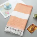 Turkish woven jacquard blanket, orange diamond pattern with white fringe, soft polycotton. - Orange