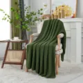Donkergroene gebreide jacquard deken plaid voor bank en woonkamer interieurdecoratie. - Donkergroen