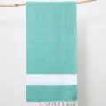 Turquoise and white Turkish diamond jacquard beach towel blanket with elegant fringe tassels. - Verdant