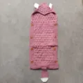 Knitted baby sleeping bag with cute animal ears and tail, cozy infant blanket sack. - Dusky Pink