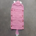 Pink knitted baby sleeping bag with cute animal ears and buttons, warm swaddle blanket. - Light Pink
