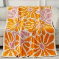 Cozy knitted feather yarn blanket featuring vibrant orange and pink floral pattern for sofa. - Yellow Large Flower