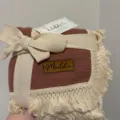 Infant gauze blanket detail view with fringe trim and personalized wooden name label. - 68x85cm-200g / Burgundy